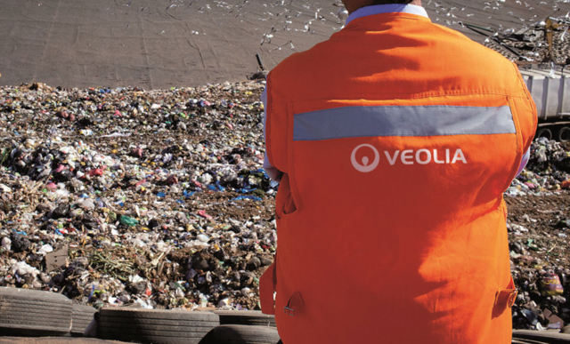 Veolia worker on rubbish tip article image