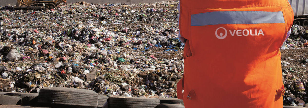 Veolia worker on rubbish tip
