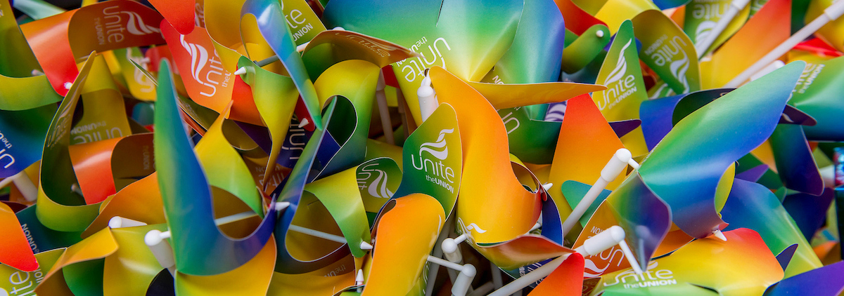 Unite pride rainbow ribbons